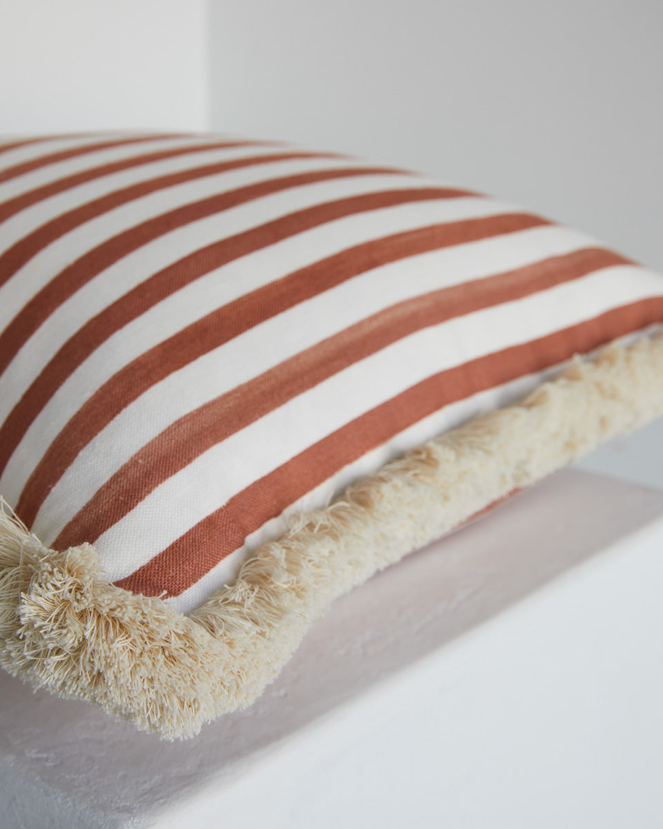 Size: Square (55x55cm) Fabric: Terracotta Stripe with Brush Fringe